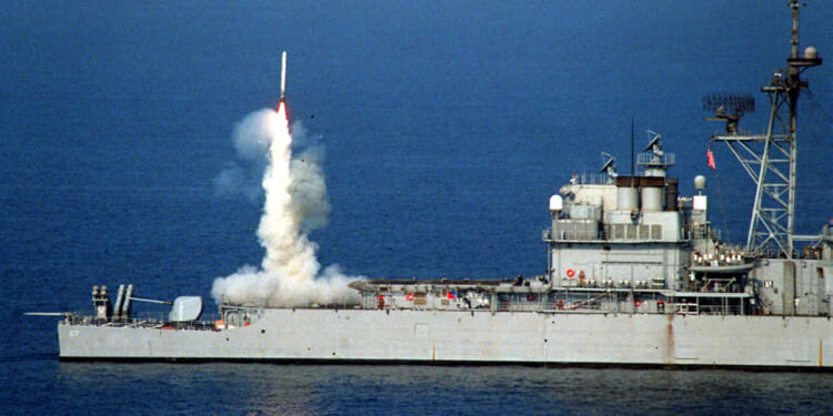 A Tomahawk cruise missile launches from the stern vertical launch system of the USS Shiloh (CG 67) to attack selected air defense targets south of the 33rd parallel in Iraq on Sept. 3, 1996, as part of Operation Desert Strike.