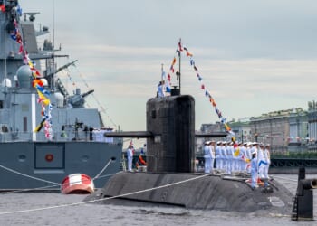 The crew on board the diesel-electric submarine St. Petersburg in the waters of the Neva River during the Main Naval Parade.