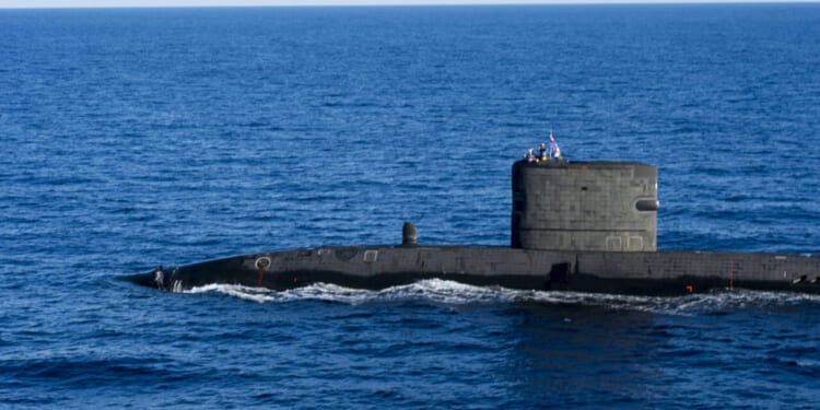 The Royal Navy Trafalager-class nuclear submarine HMS Talent (S92) participates in a coordinated anti-submarine warfare exercise.