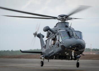 A Grey Wolf helicopter taking off.