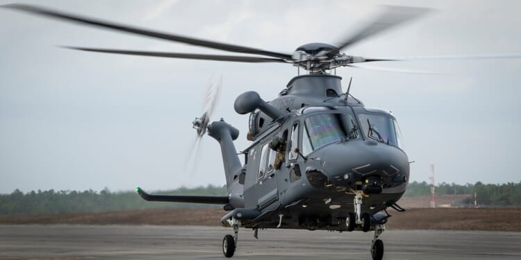 A Grey Wolf helicopter taking off.