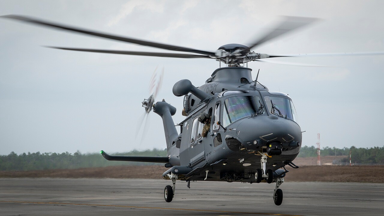A Grey Wolf helicopter taking off.