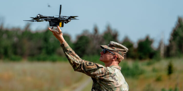 National Guard soldiers conduct stalk training during sniper school at Camp Robinson in Little Rock, Ark., Tuesday, Aug. 6, 2025.