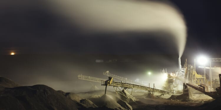 Drilling equipment in a desolate location.