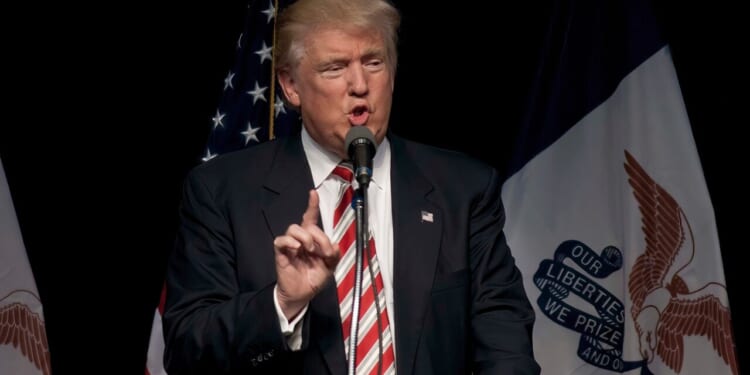 Republican presidential candidate Donald Trump addresses a group of 1600 supporters at rally in the Seven Flags event center.