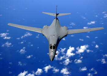 A B-1B Lancer soars over the Pacific Ocean as it maneuvers in for aerial refueling by a KC-135 Stratotanker on Sept. 30, 2005.