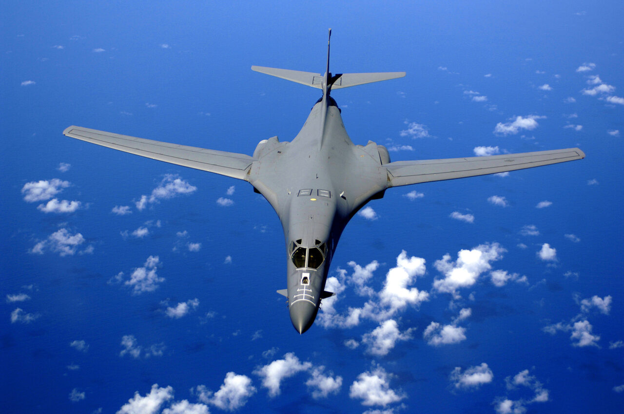 A B-1B Lancer soars over the Pacific Ocean as it maneuvers in for aerial refueling by a KC-135 Stratotanker on Sept. 30, 2005.
