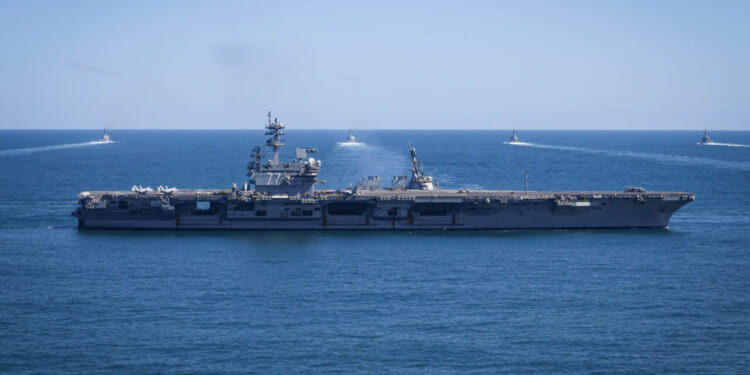 The Nimitz-class aircraft carrier USS George H.W. Bush (CVN 77) conducts a Titans of the Sea Presidential Review dress rehearsal.