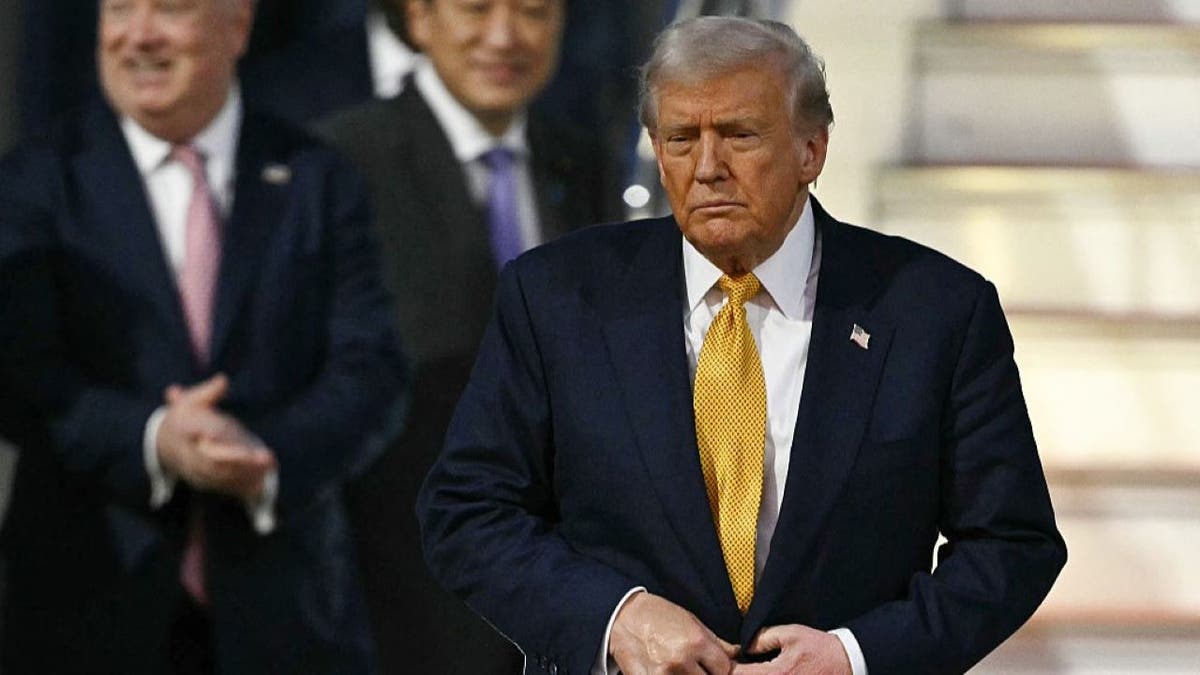 Donald Trump deplanes from Air Force One in Japan
