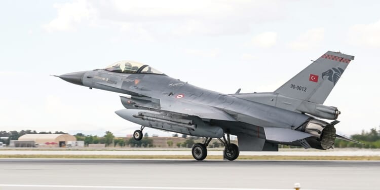 A Turkish F-16 fighter taking off.