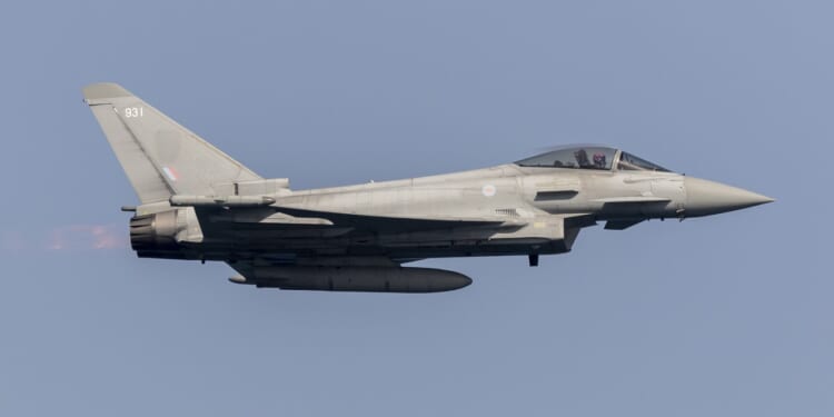 An RAF Eurofighter Typhoon FGR4 performing aerial demonstrations during Armed Forces Day celebrations in Scarborough, UK 29th June 2019.