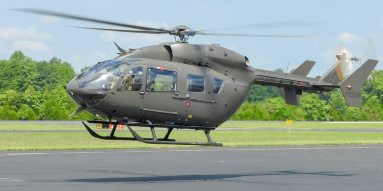A UH-72 Lakota helicopter taking off.