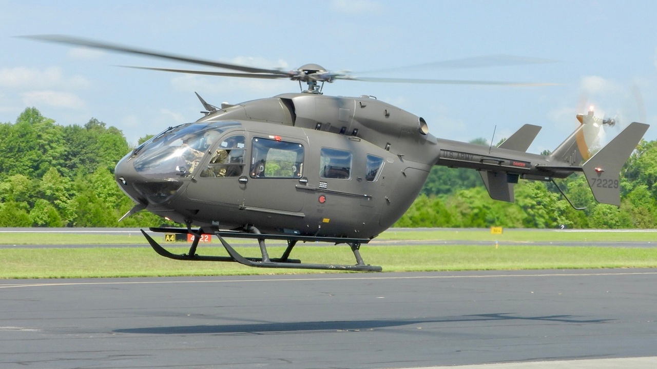 A UH-72 Lakota helicopter taking off.