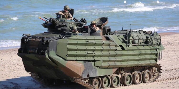 U.S. Marines, assigned to the 1st Battalion, 23rd Infantry Convoy, conduct a simulated amphibious assault during exercise BALTOPS 2017, June 6.
