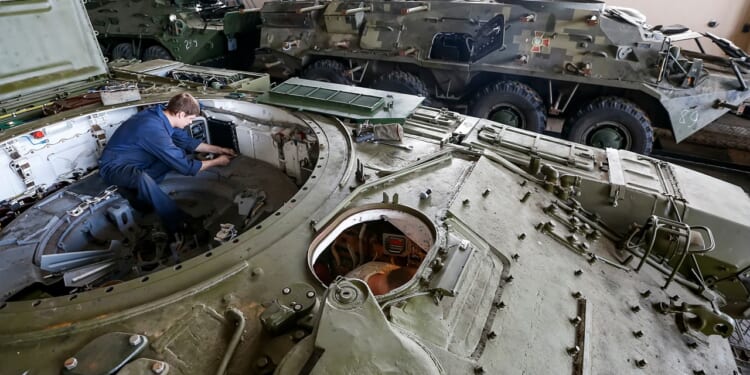 A Ukrainian tank undergoing repairs.