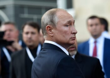 Vladimir Putin looking over his shoulder.