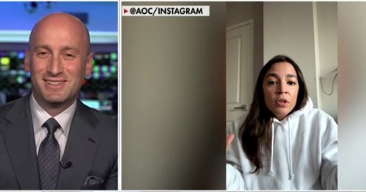 News segment featuring a male host interviewing a woman in a hoodie, discussing social media and current events.