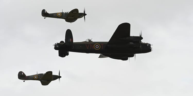 World War II-era planes flying in formation.