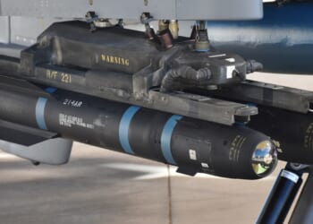 A pair of AGM-114 Hellfire missiles mounted on an MQ-9 Reaper drone.