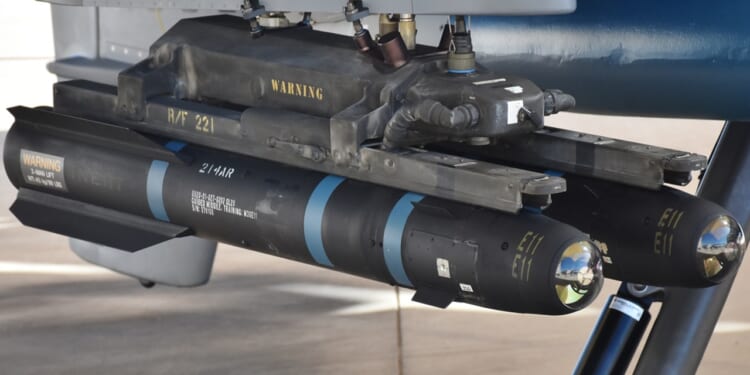 A pair of AGM-114 Hellfire missiles mounted on an MQ-9 Reaper drone.