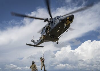 A Grey Wolf helicopter in flight.
