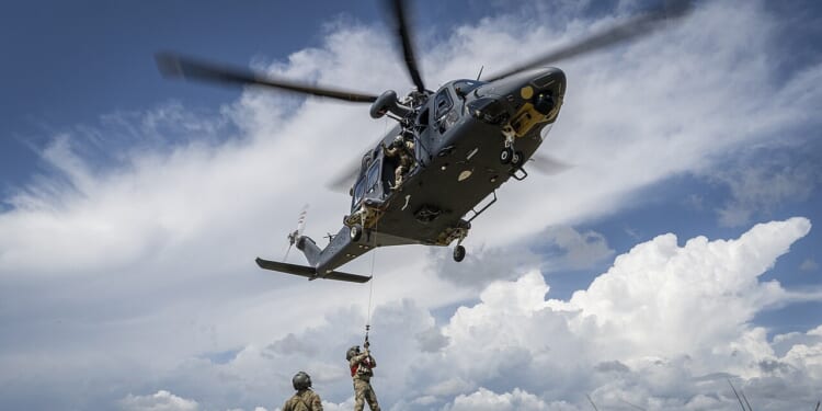 A Grey Wolf helicopter in flight.