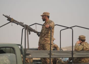 Pakistani military stands on guard.