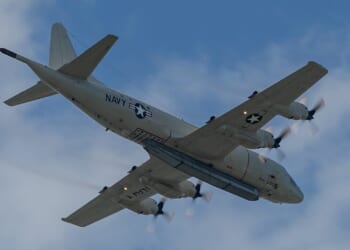 A US Navy P-3C Orion plane in flight.