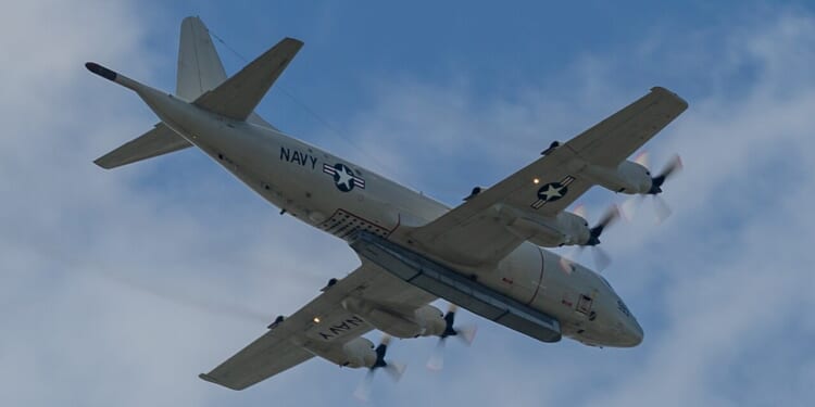 A US Navy P-3C Orion plane in flight.