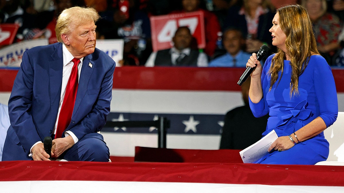 Former President Donald Trump and Arkansas Gov. Sarah Huckabee Sanders in 2024