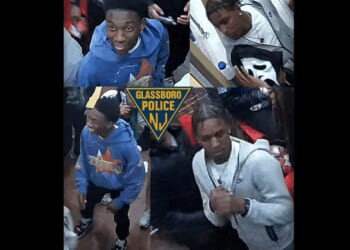 Pair of punks caught on video chucking chair at cops — hitting one in back of head — during Domino's Pizza brawl: Police