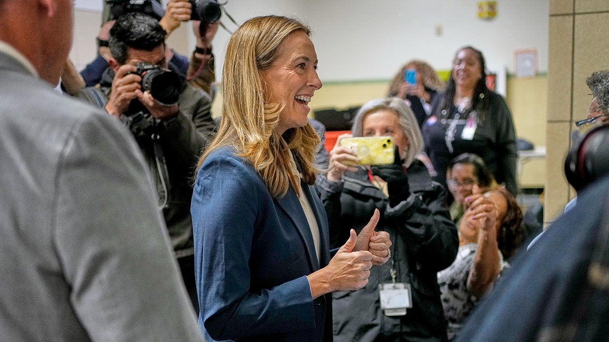 New Jersey gubernatorial candidate Mikie Sherrill gives thumbs up after voting on Election Day