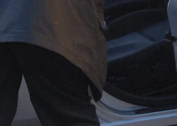 Video: Woman pulls male intruder out of her car, throws him to the ground with ease — while her amazed husband watches