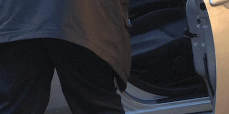 Video: Woman pulls male intruder out of her car, throws him to the ground with ease — while her amazed husband watches