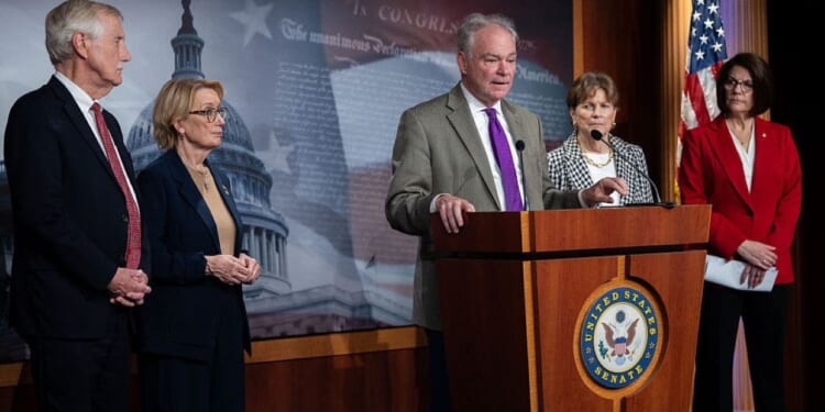 Eight Senate Democrats break with party to end government shutdown