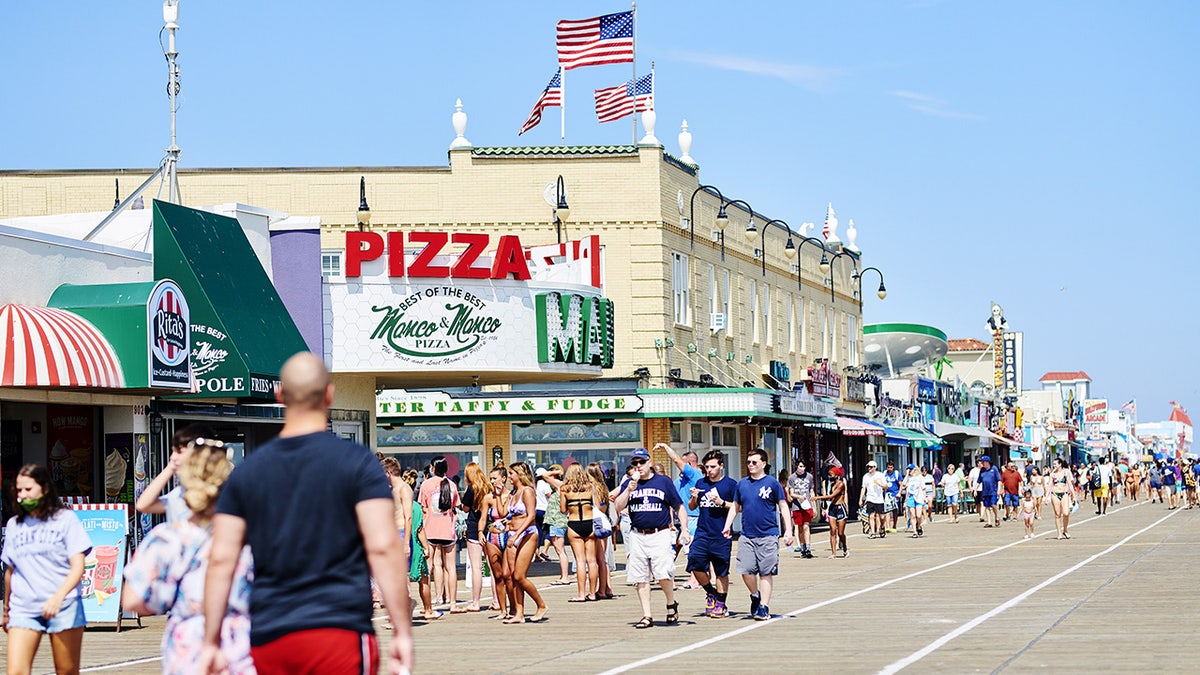 Ocean City, New Jersey, visitors walk on the boardwalk