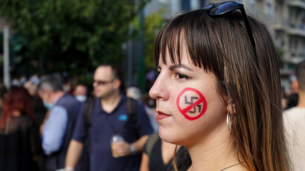 Anti-fascist protesters outside the court, where the trial of leaders and members of the Golden Dawn far-right party is taking place on October 7, 2020 in Athens, Greece.