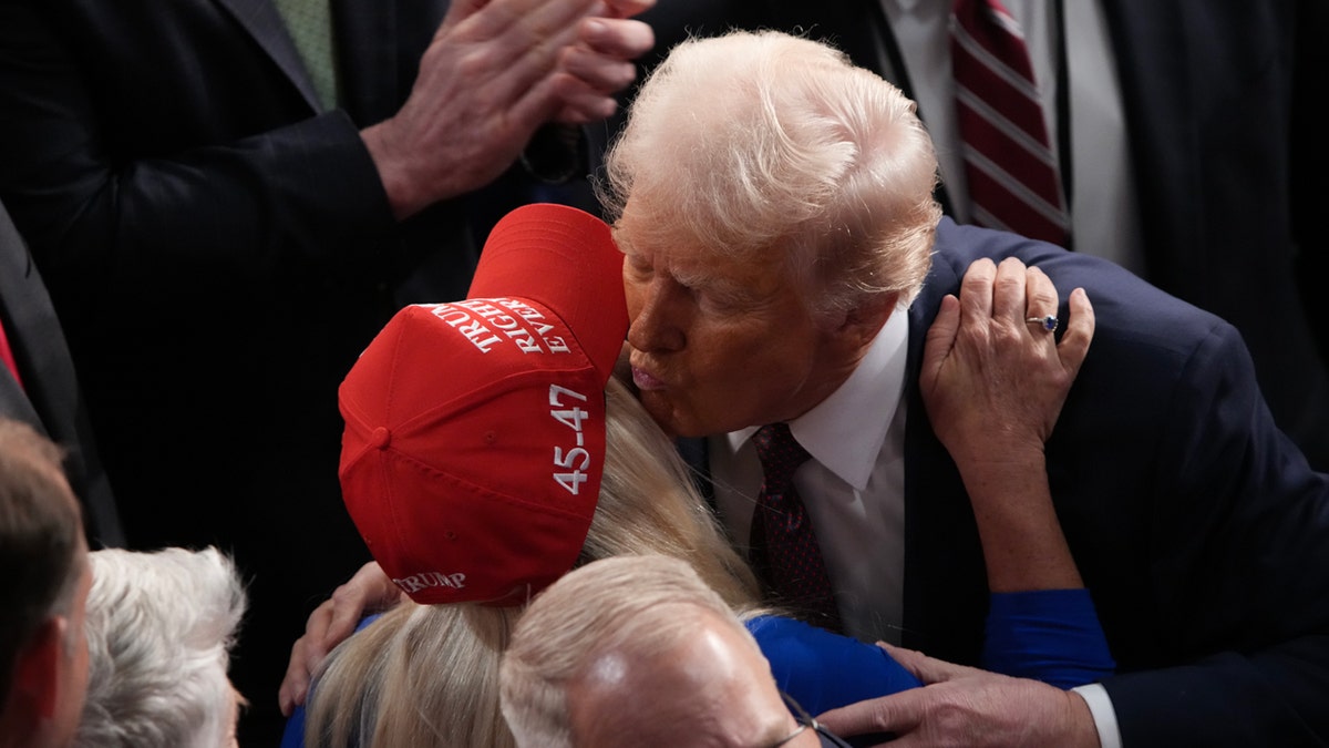 Trump kisses MTG