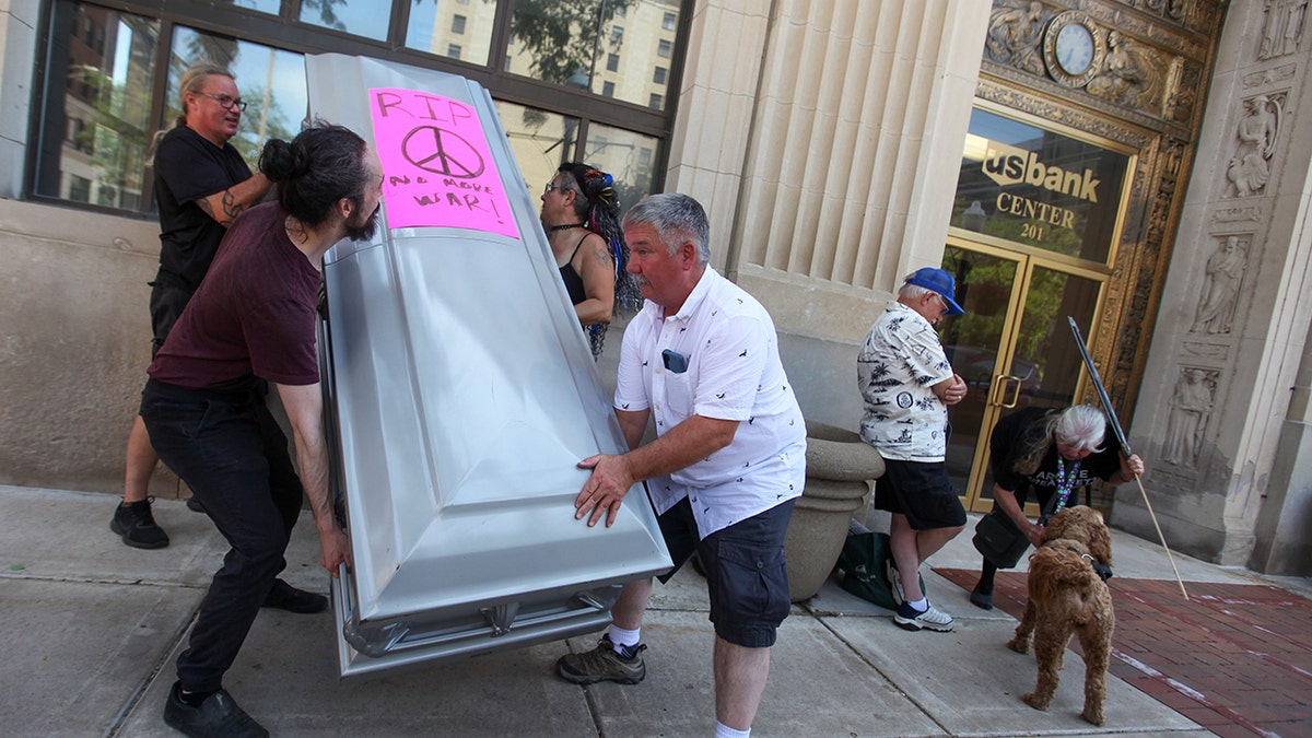 Medicaid protesters place casket outside GOP Senators office