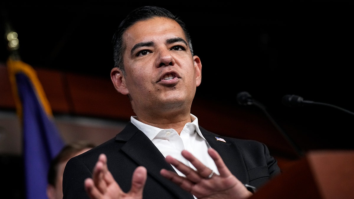 Rep. Robert Garcia speaks to the media