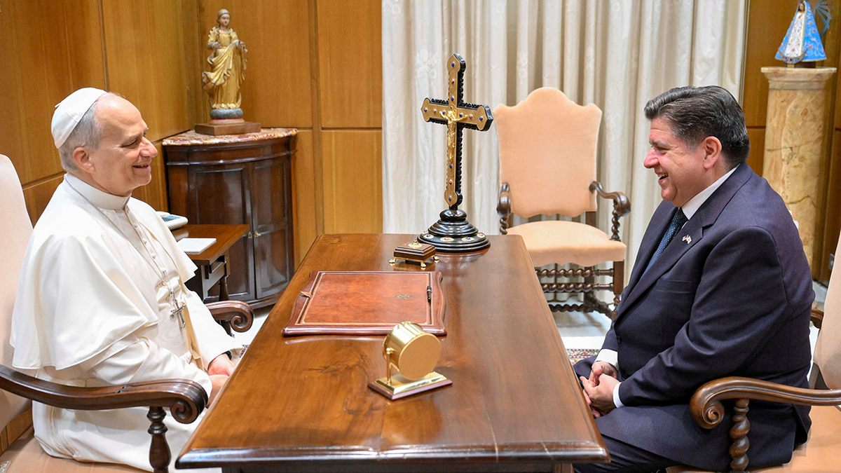 Pope Leo and Pritzker at desk