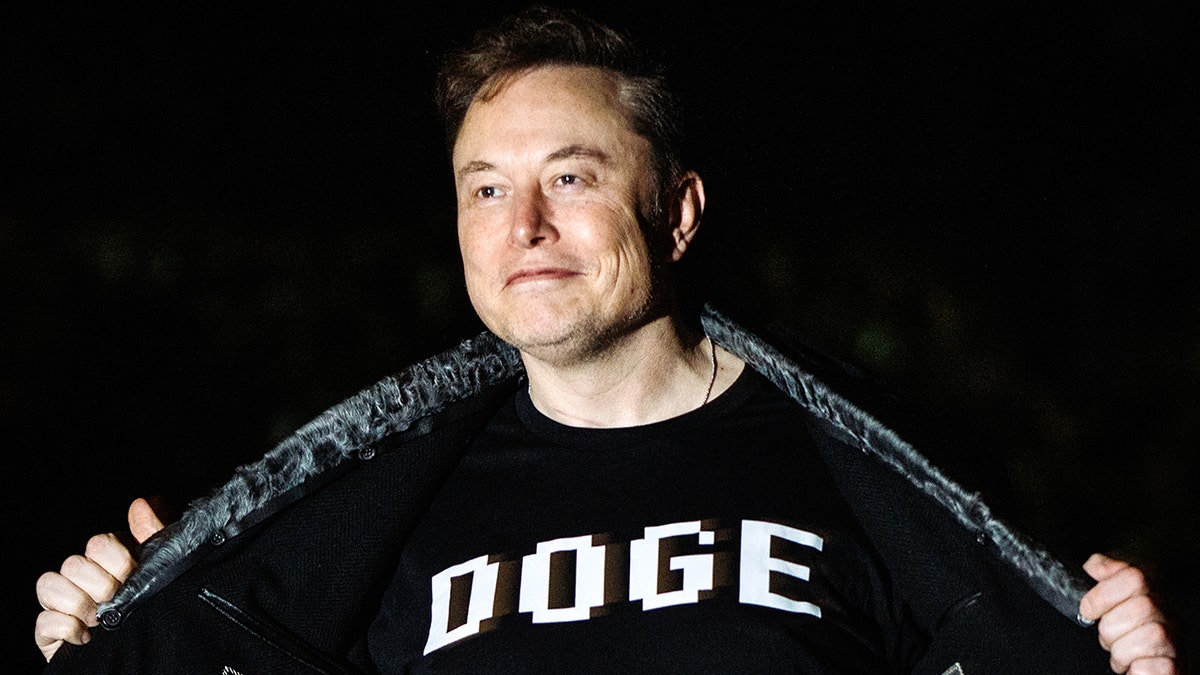 Elon Musk shows off DOGE shirt
