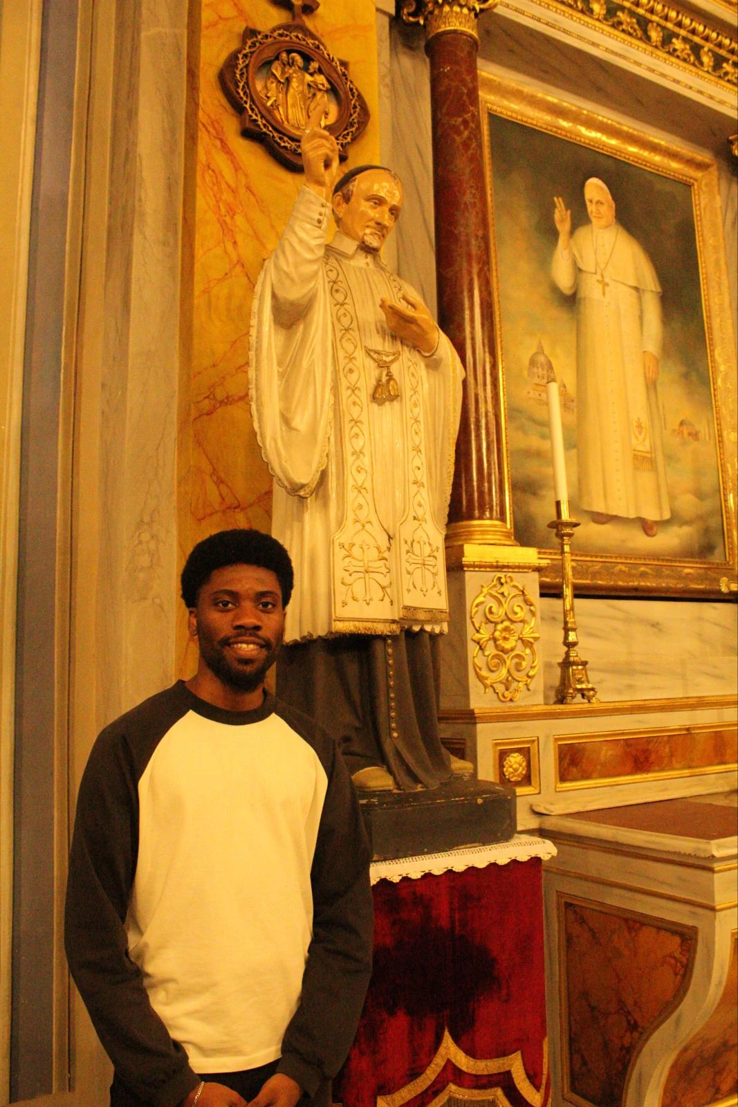 Philip Tata, originally from Cameroon and now serving as president of the youth group at the Cathedral of the Holy Spirit, said of the Holy Father's visit that he hopes it might inspire renewed support and encouragement for the younger generation. Credit: Romy Haber