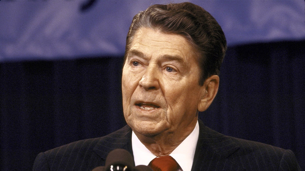 Reagan seen fielding questions from the media during the Iran-Contra scandal