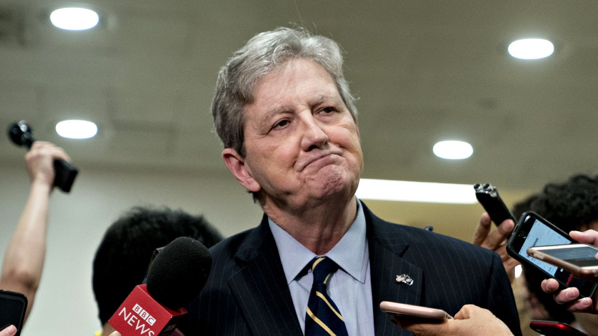 Louisiana Sen. John Kennedy speaks to reporters