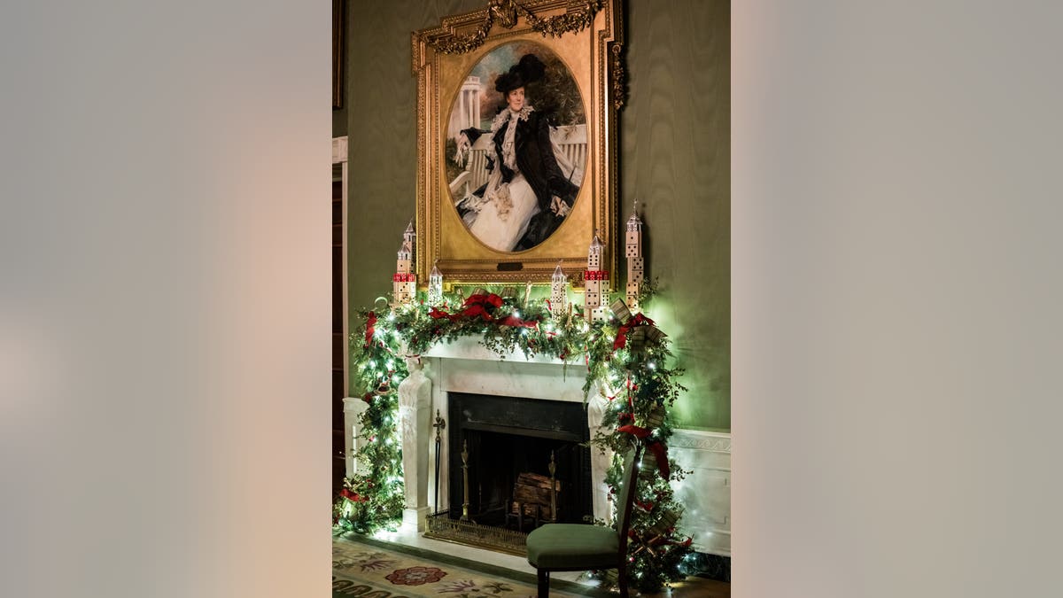 The Green Room’s theme is "Home is Where the Heart Is: Family Fun." The room highlights America’s favorite games and activities, with playing cards; Lego portraits of President Trump and President George Washington; dominoes and more. (Official White House Photo by Andrea Hanks)