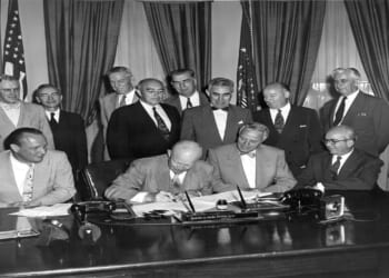 President Eisenhower signs H.R. 9757, an act "to amend the Atomic Energy Act of 1946."