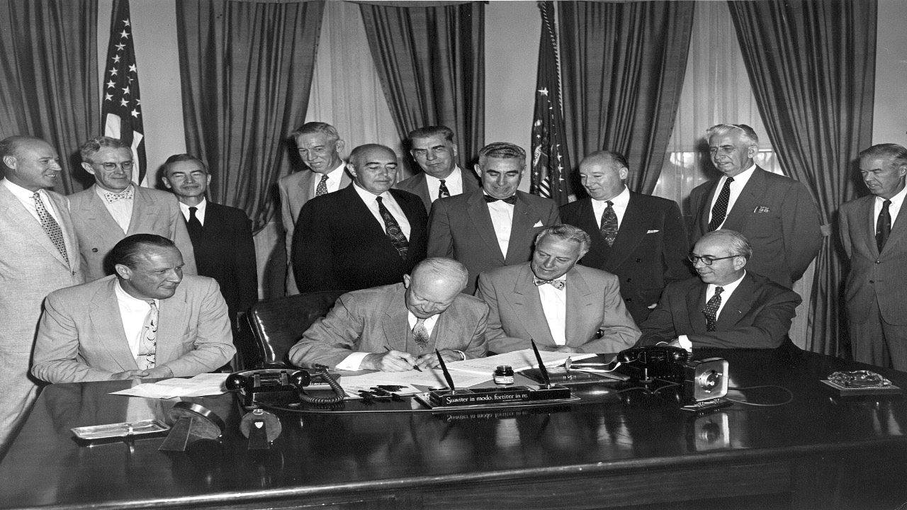 President Eisenhower signs H.R. 9757, an act "to amend the Atomic Energy Act of 1946."