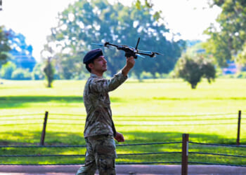 U.S. Air Force Senior Airman Anthony Cruz, 2nd Security Forces Squadron electronic warfare airman, catches a drone during a demonstration at Barksdale Air Force Base, Louisiana, September 3, 2024.