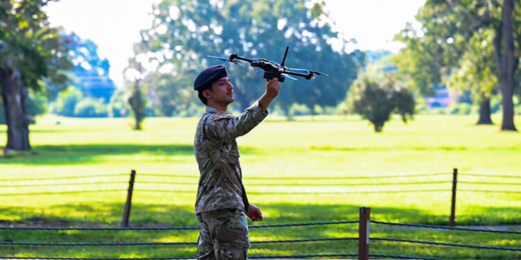 U.S. Air Force Senior Airman Anthony Cruz, 2nd Security Forces Squadron electronic warfare airman, catches a drone during a demonstration at Barksdale Air Force Base, Louisiana, September 3, 2024.
